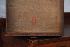 Gustav Stickley early large red decal signature 1904 to 1906.